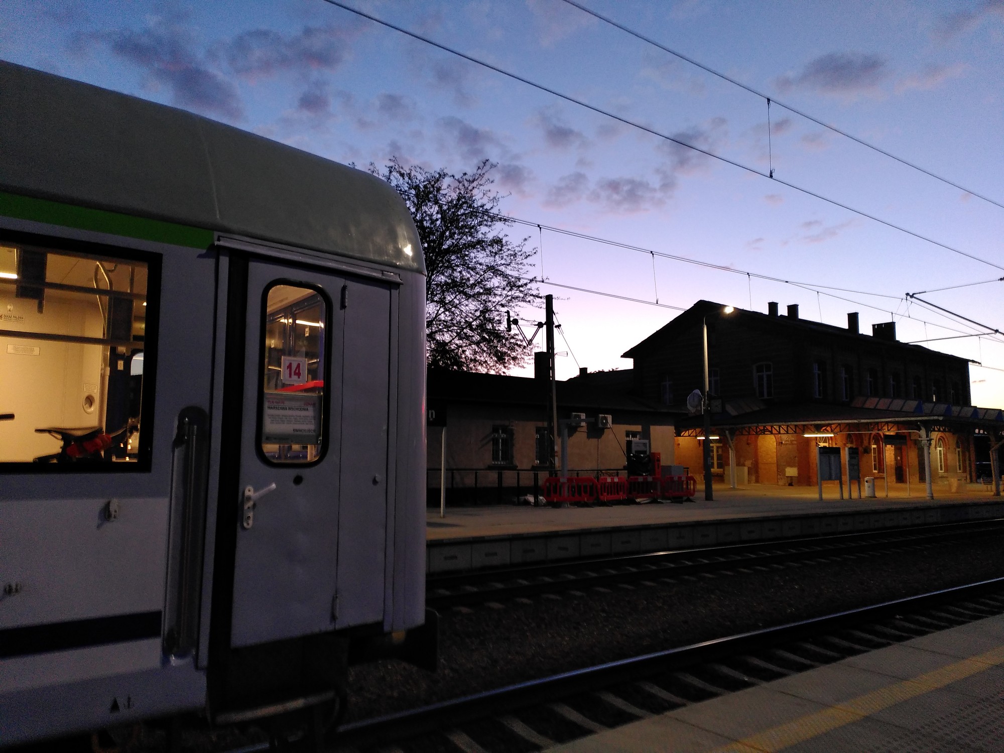 Picture of the Rzepin train station with the end of a train in frame.